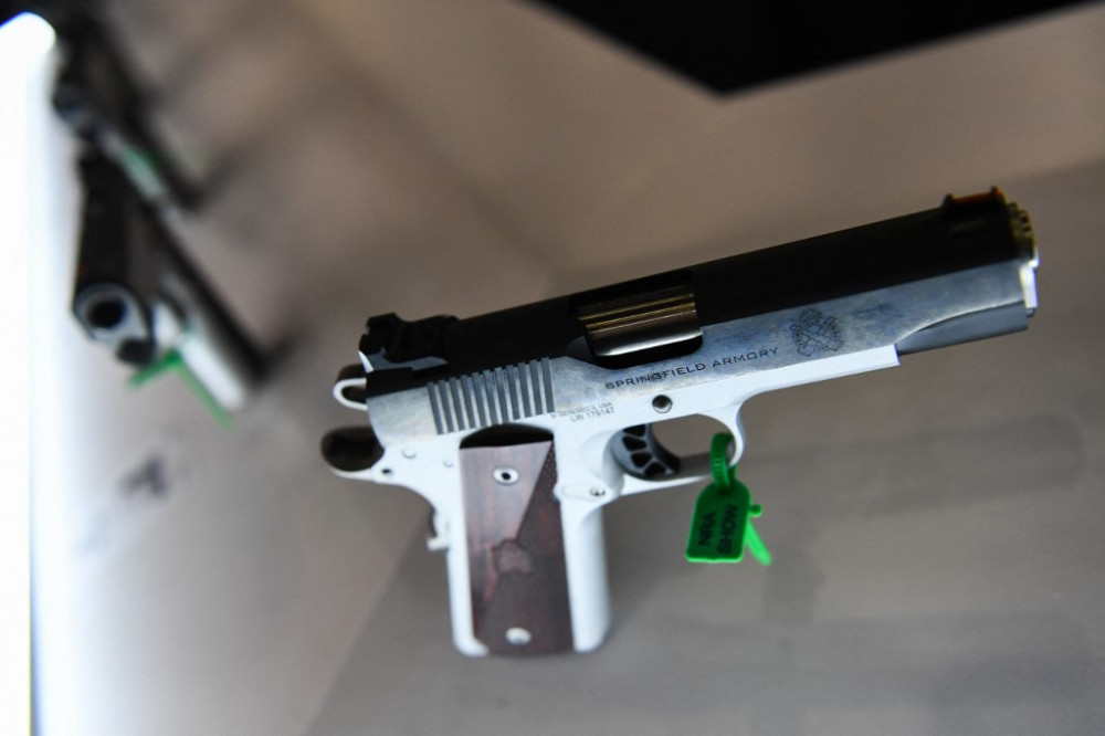 A Springfield Armory 1911 Ronin handgun in 9mm is displayed during the National Rifle Association (NRA) Annual Meeting at the George R. Brown Convention Center, in Houston, Texas on May 28, 2022. - America's powerful National Rifle Association kicked off 