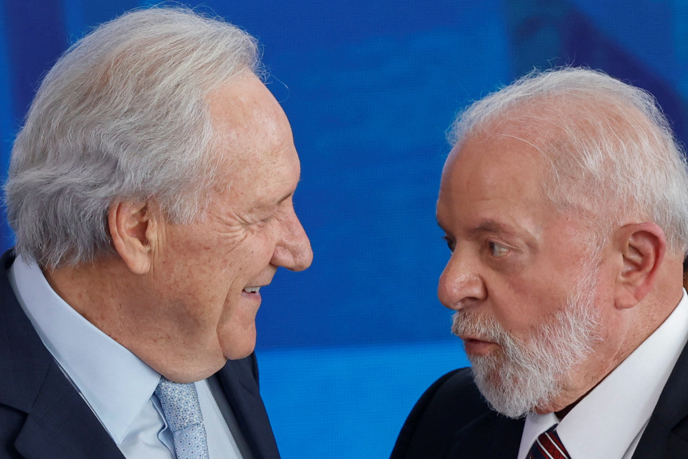 Brazil's new Justice Minister Ricardo Lewandowski talks with Brazil's President Luiz Inacio Lula da Silva during his inauguration ceremony at Planalto Palace in Brasilia, Brazil, February 1, 2024. REUTERS/Adriano Machado